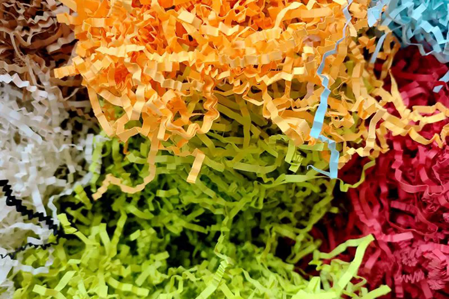 How Roll Feeding Crinkle Paper Machines Improve Packaging Efficiency